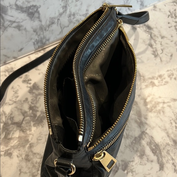 Vince Camuto Black and Gold Crossbody Bag with V-Shaped Zipper Design - Picture 6 of 6